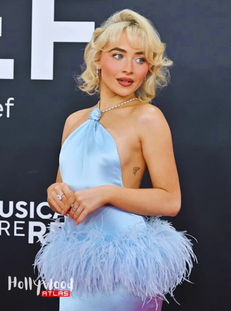 Sabrina Carpenter outfit styled as a modern holiday party look