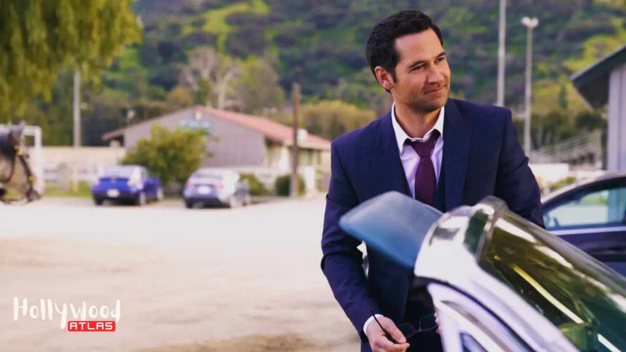 Manuel Garcia-Rulfo as Mickey Haller beside his signature car in The Lincoln Lawyer Season 4